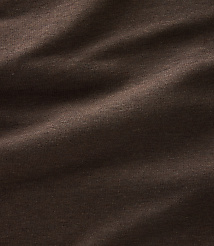 Dark brown fabric with soft folds and subtle highlights creates a textured background. carousel Product Image 3