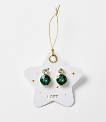 A pair of emerald green gemstone earrings dangle from a gold string attached to a white star-shaped card with gold accents and the "LOFT" logo, set against a plain white background. carousel Product Image 1