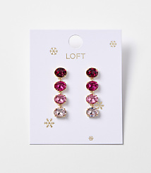 A pair of oval gemstone drop earrings in shades of pink and red hang from a white card with snowflake accents. carousel Product Image 1