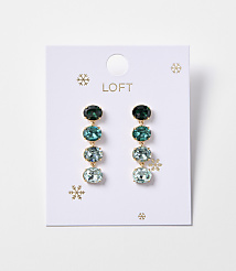 A pair of oval gemstone drop earrings in shades of green and blue hang from a white Loft card adorned with snowflakes. carousel Product Image 1