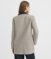 A woman in a checkered jacket stands against a plain gray background. carousel Product Image 4