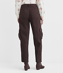 A person wearing brown cargo pants and a patterned blouse stands against a plain white background. carousel Product Image 3