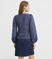 A woman in a blue plaid puff-sleeve top and denim skirt stands against a plain white background. carousel Product Image 3
