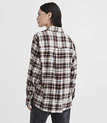 A woman in a plaid shirt stands against a plain background. carousel Product Image 3