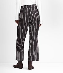 A person wearing pinstripe pants and brown boots stands against a plain white background. carousel Product Image 3