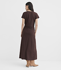A woman in a brown dress and boots stands against a plain white background. carousel Product Image 3