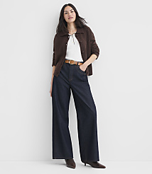 A woman in a white top, brown cardigan, and wide-leg jeans stands against a plain white background. carousel Product Image 2