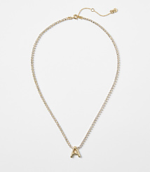 A gold letter "A" pendant hangs from a delicate, diamond-encrusted chain against a plain white background. carousel Product Image 1