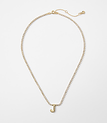A gold necklace with a single letter "J" charm and a white background. carousel Product Image 1