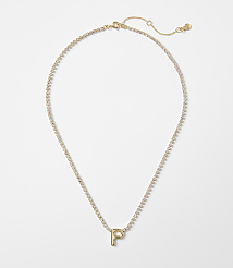 A gold letter "P" pendant on a delicate, diamond-studded chain rests against a plain white background. carousel Product Image 1
