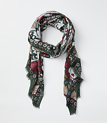 A green scarf with a floral and book pattern hangs against a plain white background. carousel Product Image 1