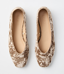 A pair of crushed velvet ballet flats with "LOFT" branding rests on a plain white background. carousel Product Image 3