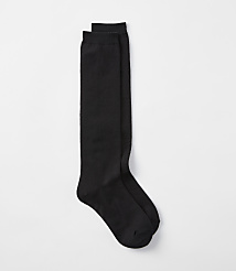 A pair of black knee-high socks lies on a plain white background. carousel Product Image 1