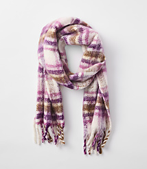 A fuzzy, plaid scarf in shades of pink, purple, and brown hangs against a plain white background. carousel Product Image 1