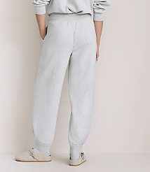 A person wearing light gray sweatpants and clogs stands against a plain, light-colored background. carousel Product Image 3