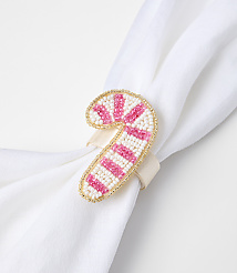 A beaded candy cane napkin ring with pink and white stripes adorns a white cloth napkin against a plain background. carousel Product Image 2