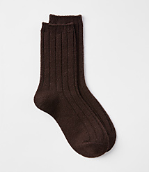 A pair of fuzzy brown ribbed socks rests on a plain white background. carousel Product Image 1