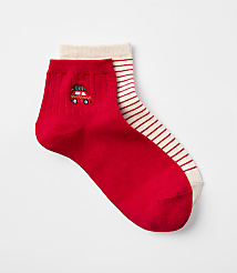 A pair of red socks, one with a small embroidered car and the other with red stripes, are laid out against a plain white background. carousel Product Image 1
