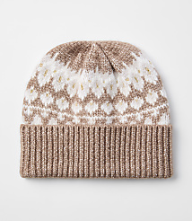 A knitted beanie with a ribbed brim in a light brown color is in the foreground, while the background is a plain white surface. carousel Product Image 1