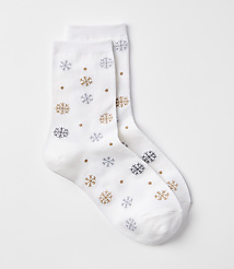 A pair of white socks with a snowflake pattern are laid out against a plain white background. carousel Product Image 1