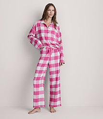 A woman stands in pink and white checkered pajamas against a plain white background. carousel Product Image 2