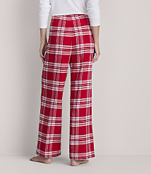 A person wearing red and white plaid pajama pants stands against a plain, light-colored background. carousel Product Image 3