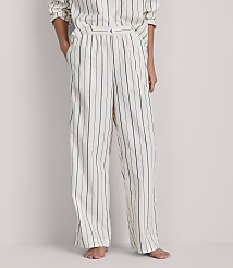 A person stands in striped pajamas against a plain background. carousel Product Image 2