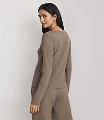 A woman in a brown long-sleeved shirt and pants stands against a plain, light-colored background. carousel Product Image 3