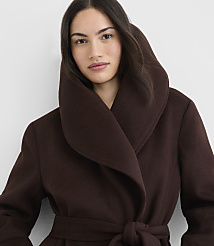 A woman in a brown coat with a large collar stands against a plain white background. carousel Product Image 4