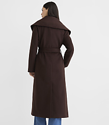 A woman in a long brown coat stands against a plain white background. carousel Product Image 3