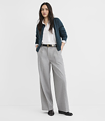 A woman in a teal cardigan and gray wide-leg pants stands against a plain white background. carousel Product Image 1