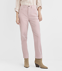 A person stands in light pink corduroy pants and tan ankle boots against a plain white background. carousel Product Image 2