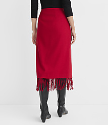 A person wearing a red fringed skirt and black boots stands against a plain white background. carousel Product Image 4
