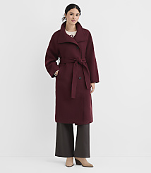 A woman in a burgundy coat and dark pants stands against a plain white background. carousel Product Image 2