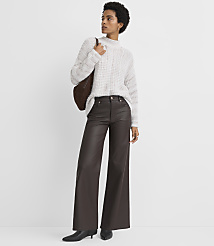 A woman in a cream sweater and brown wide-leg pants stands against a plain white background. carousel Product Image 3