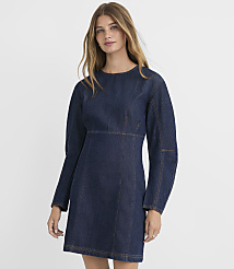 A woman in a dark denim dress with puffed sleeves stands against a plain white background. carousel Product Image 2