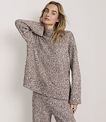 A woman wearing a brown and white speckled knit sweater and matching pants stands against a plain white background. carousel Product Image 2