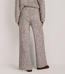 A person wears a matching brown and white textured knit sweater and wide-leg pants against a plain white background. carousel Product Image 3