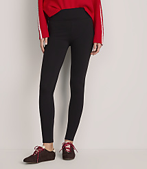 A person wearing a red sweater, black leggings, and brown sneakers stands against a plain light gray background. carousel Product Image 2