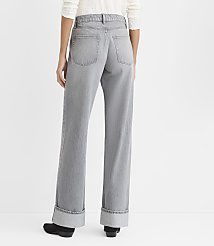 A person wearing wide-leg grey jeans and black shoes stands against a plain white background. carousel Product Image 3