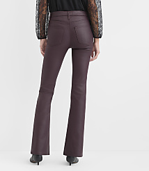A person wearing burgundy faux-leather flare pants and a black lace top stands against a plain white background. carousel Product Image 2