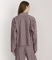 A woman in a black and white checkered jacket and pants stands against a plain white background. carousel Product Image 3