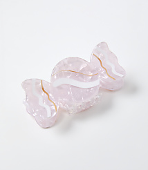 A pink, translucent butterfly-shaped hair claw clip with gold and white wavy accents rests on a plain white background. carousel Product Image 1