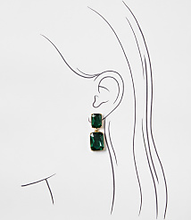 A pair of emerald green drop earrings hangs from the ear of a minimalist line drawing of a woman's profile against a plain white background. carousel Product Image 2