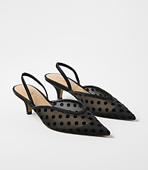 A pair of black polka-dot mesh pointed-toe kitten heels sits against a plain white background. carousel Product Image 1