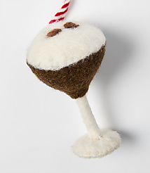 A felted coconut cocktail ornament with a red and white striped straw hangs against a plain white background. carousel Product Image 2