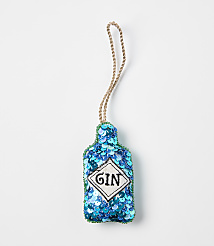 A blue sequined gin bottle ornament with a gold string hangs against a plain white background. carousel Product Image 1