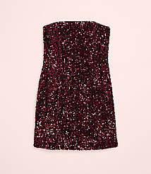 A strapless, burgundy sequined mini dress is centered against a solid light pink background. carousel Product Image 4