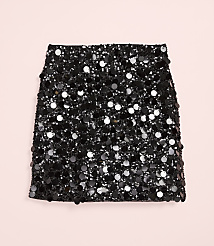 A black sequined skirt is centered against a plain light pink background. carousel Product Image 4