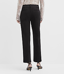 A person wearing a lace top, black trousers, and black heels stands against a plain white background. carousel Product Image 3